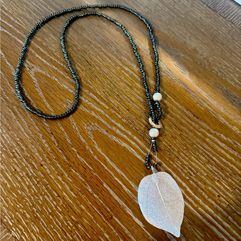 Beaded necklace with silver dipped leaf